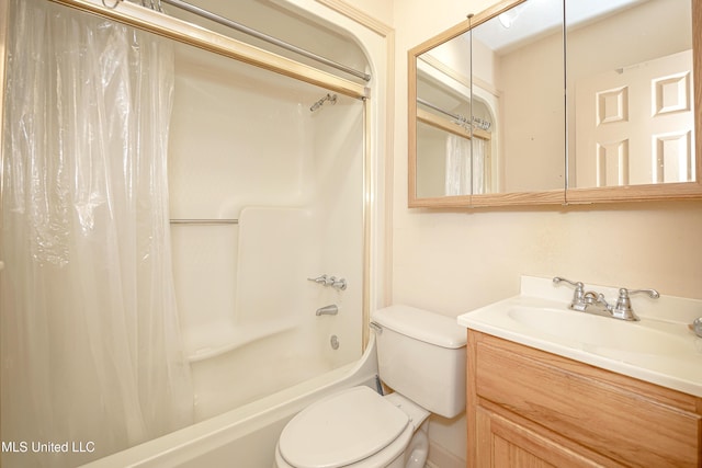 full bathroom with shower / bath combination with curtain, vanity, and toilet