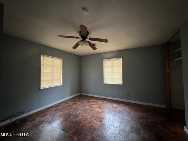 230 Hillside Dr, Vicksburg, MS 39180 - empty room with baseboards and a ceiling fan