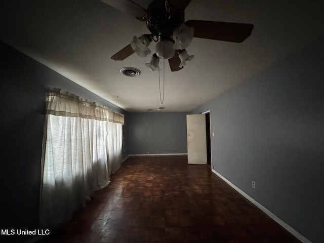 230 Hillside Dr, Vicksburg, MS 39180 - unfurnished room with visible vents, baseboards, and ceiling fan
