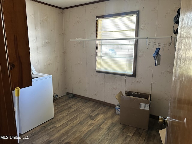 laundry room featuring laundry area, washer / clothes dryer, wood finished floors, and baseboards