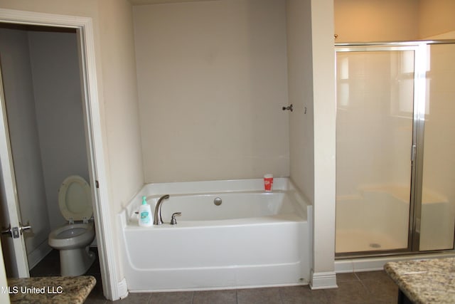 full bathroom with tile patterned floors, vanity, toilet, and independent shower and bath