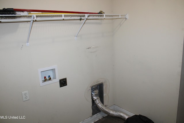 clothes washing area with hookup for an electric dryer and hookup for a washing machine