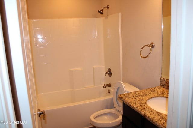 full bathroom featuring shower / tub combination, vanity, and toilet