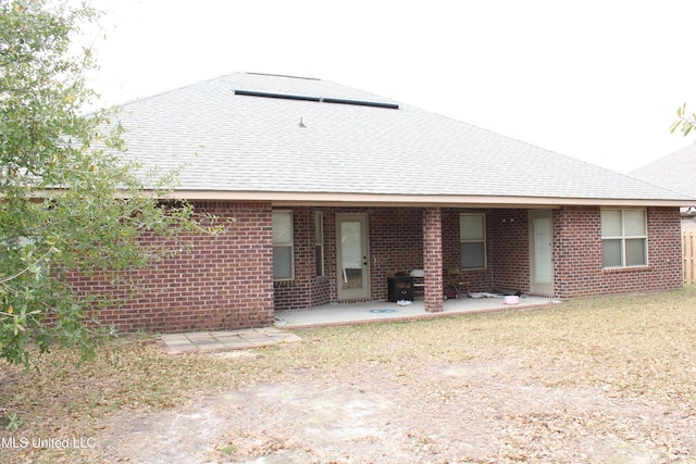 rear view of house with a patio area