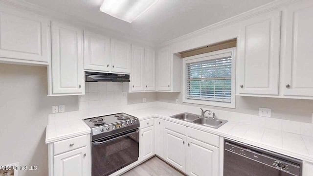 594 Acorn Ln, Brandon, MS 39047 - kitchen with range with electric stovetop, black dishwasher, under cabinet range hood, white cabinets, and backsplash