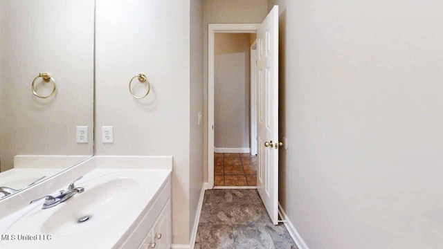 594 Acorn Ln, Brandon, MS 39047 - bathroom with vanity and baseboards