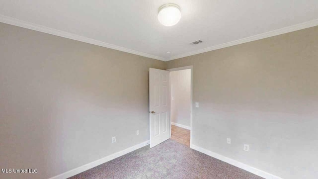594 Acorn Ln, Brandon, MS 39047 - carpeted spare room featuring baseboards and crown molding