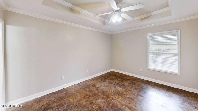 594 Acorn Ln, Brandon, MS 39047 - unfurnished room with a tray ceiling, crown molding, and ceiling fan
