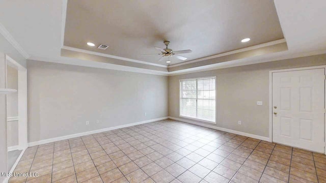 594 Acorn Ln, Brandon, MS 39047 - tiled spare room with a tray ceiling, a ceiling fan, crown molding, and recessed lighting