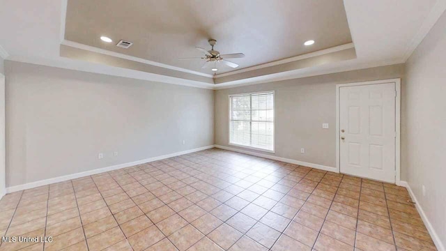 594 Acorn Ln, Brandon, MS 39047 - unfurnished room featuring a tray ceiling, a ceiling fan, light tile patterned flooring, recessed lighting, and crown molding
