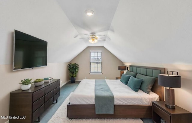 bedroom with lofted ceiling, light colored carpet, ceiling fan, and baseboards