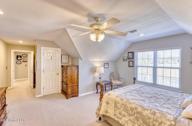 bedroom featuring light carpet, baseboards, visible vents, a ceiling fan, and vaulted ceiling