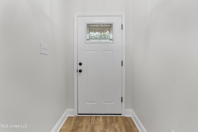 doorway to outside featuring light wood-type flooring