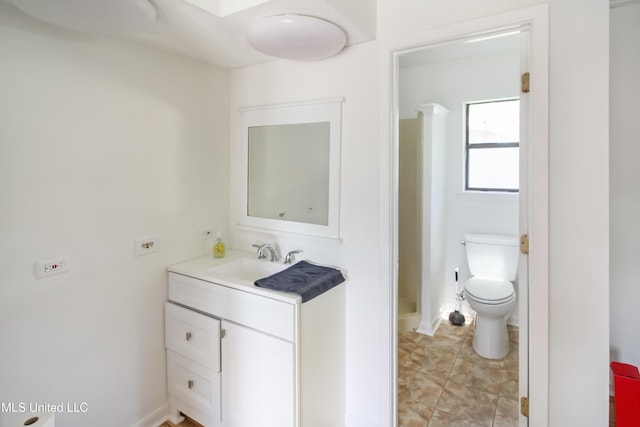 full bathroom featuring toilet, tile patterned flooring, a shower, and vanity