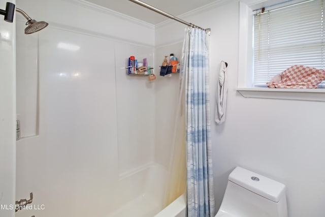 bathroom featuring crown molding, shower / bath combination with curtain, and toilet