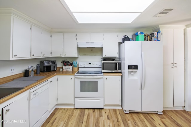 kitchen featuring visible vents, white appliances, light wood-style floors, and under cabinet range hood