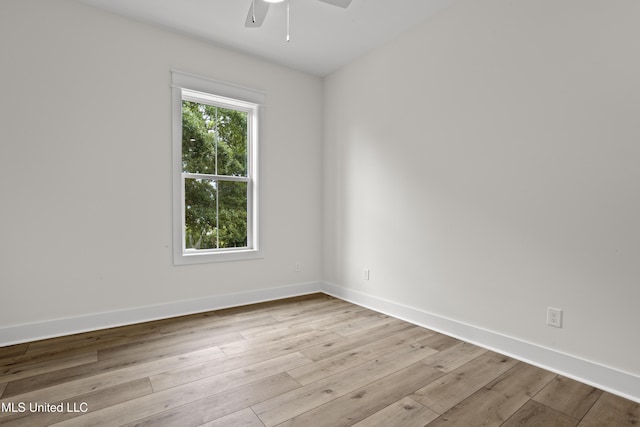 124 Court St, Bay Saint Louis, MS 39520 - empty room featuring a ceiling fan and wood finished floors