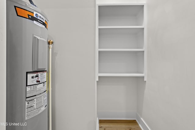 124 Court St, Bay Saint Louis, MS 39520 - interior space featuring electric water heater