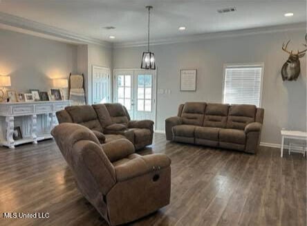 361 Cherry Bark Ln, Courtland, MS 38620 - living room featuring dark wood-style floors, crown molding, baseboards, and recessed lighting