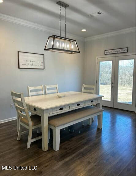 361 Cherry Bark Ln, Courtland, MS 38620 - dining room with ornamental molding, french doors, dark wood-style flooring, recessed lighting, and baseboards