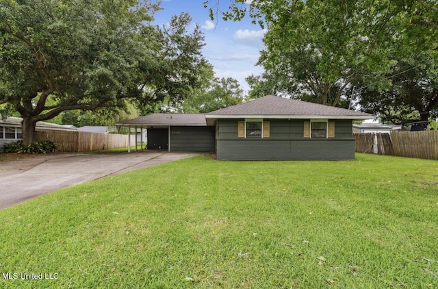 2206 Belair St, Pascagoula, MS 39567 - view of front of home with concrete driveway, a carport, and brick siding