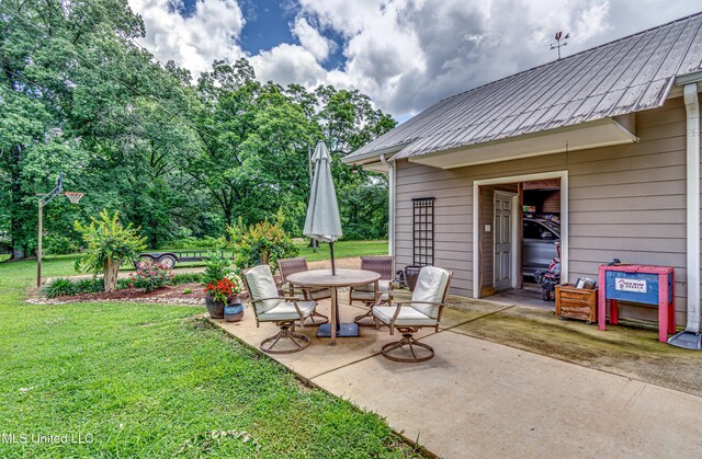4661 Wildwood Rd, Benton, MS 39039 - view of patio featuring outdoor dining area