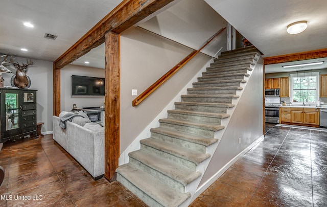 4661 Wildwood Rd, Benton, MS 39039 - stairs with baseboards and recessed lighting