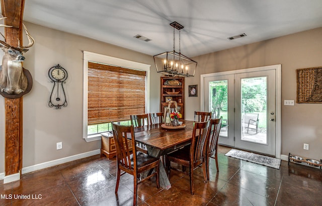 4661 Wildwood Rd, Benton, MS 39039 - dining space with baseboards and a chandelier