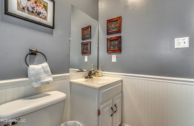 4661 Wildwood Rd, Benton, MS 39039 - bathroom with a wainscoted wall, vanity, and toilet