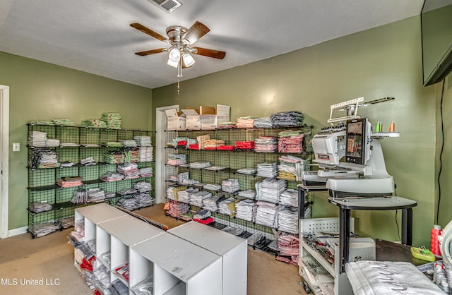4661 Wildwood Rd, Benton, MS 39039 - storage room featuring ceiling fan