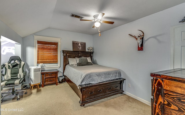 4661 Wildwood Rd, Benton, MS 39039 - bedroom with vaulted ceiling, carpet flooring, a ceiling fan, and baseboards