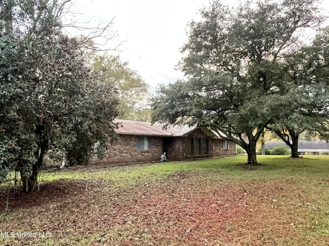 view of front of home with a front yard