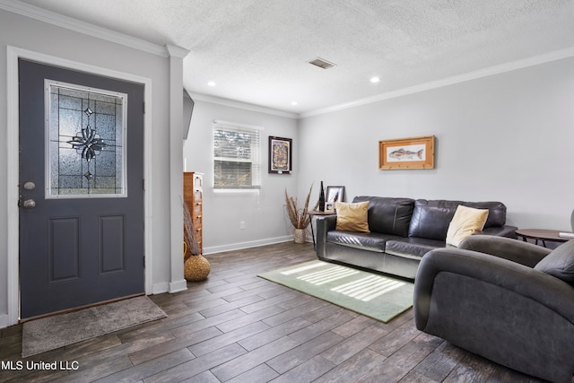 living room with ornamental molding, a textured ceiling, and dark hardwood / wood-style flooring