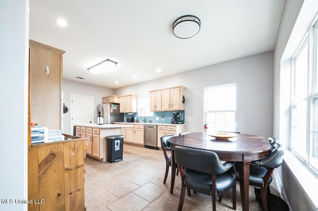 10053 Kingston Rd, Bay Saint Louis, MS 39520 - dining space with healthy amount of natural light and recessed lighting