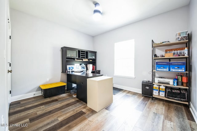 10053 Kingston Rd, Bay Saint Louis, MS 39520 - office area featuring wood finished floors and baseboards