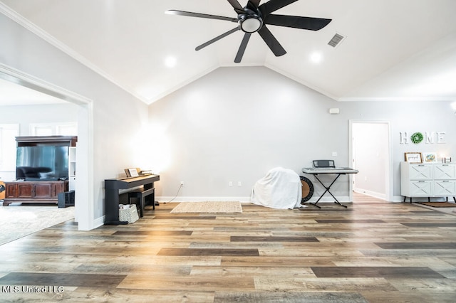 10053 Kingston Rd, Bay Saint Louis, MS 39520 - living area with a ceiling fan, wood finished floors, lofted ceiling, crown molding, and baseboards