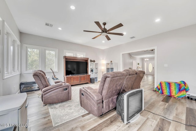 10053 Kingston Rd, Bay Saint Louis, MS 39520 - living room with a ceiling fan, recessed lighting, light wood-style floors, and baseboards