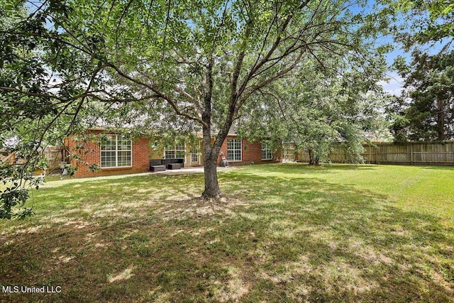 view of yard featuring fence