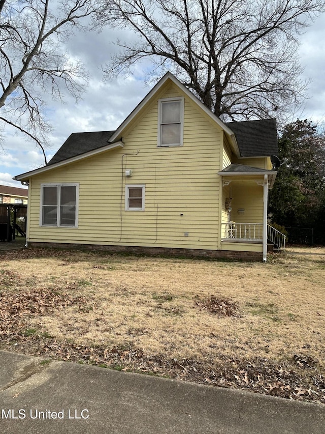 view of home's exterior with a porch