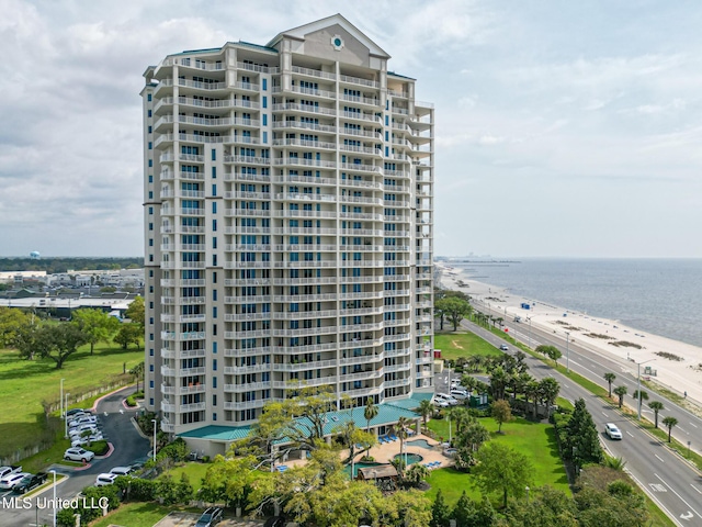 view of building exterior featuring a water view