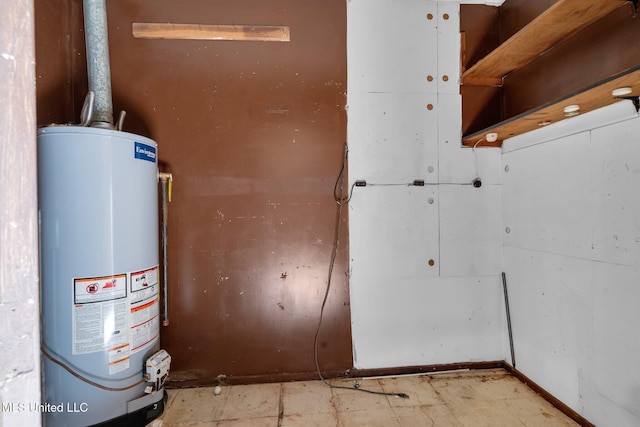 utility room with gas water heater