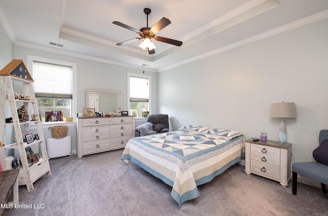 1668 Farindale Cv, Nesbit, MS 38651 - bedroom with carpet, a tray ceiling, multiple windows, and crown molding