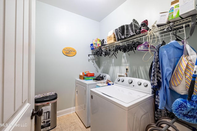 1668 Farindale Cv, Nesbit, MS 38651 - washroom featuring washer and dryer and light tile patterned floors