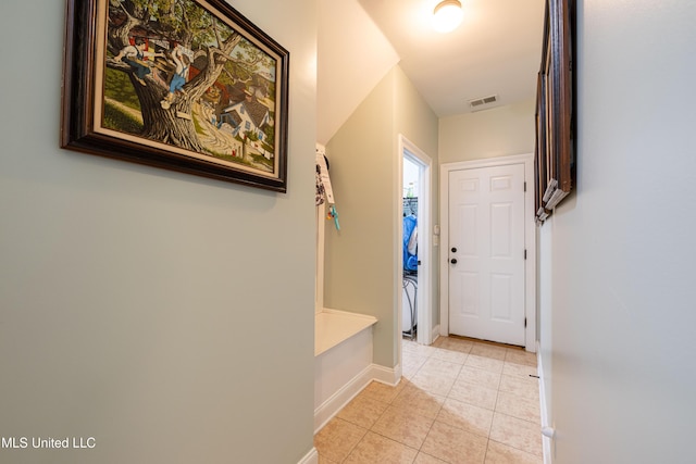 1668 Farindale Cv, Nesbit, MS 38651 - entrance foyer featuring light tile patterned floors and baseboards