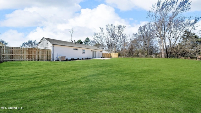 view of yard featuring cooling unit and a fenced backyard