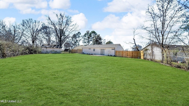 view of yard with fence