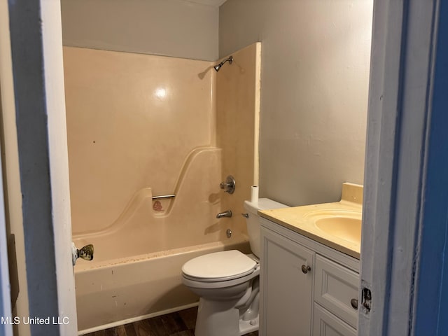 full bathroom with shower / tub combination, vanity, and toilet