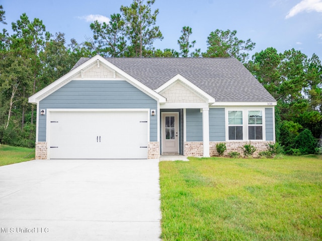 view of front of property featuring concrete driveway, a front lawn, an attached garage, and brick siding