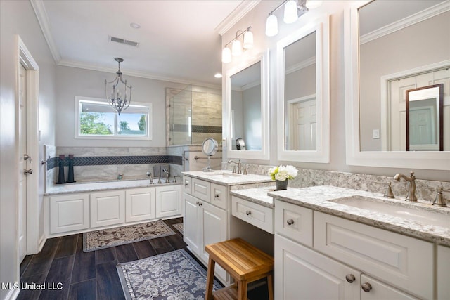 bathroom with ornamental molding, hardwood / wood-style floors, vanity, and plus walk in shower