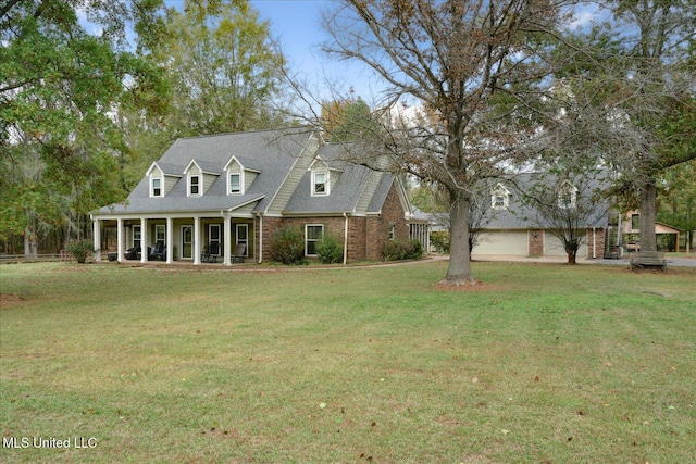 cape cod-style house with a porch and a front yard